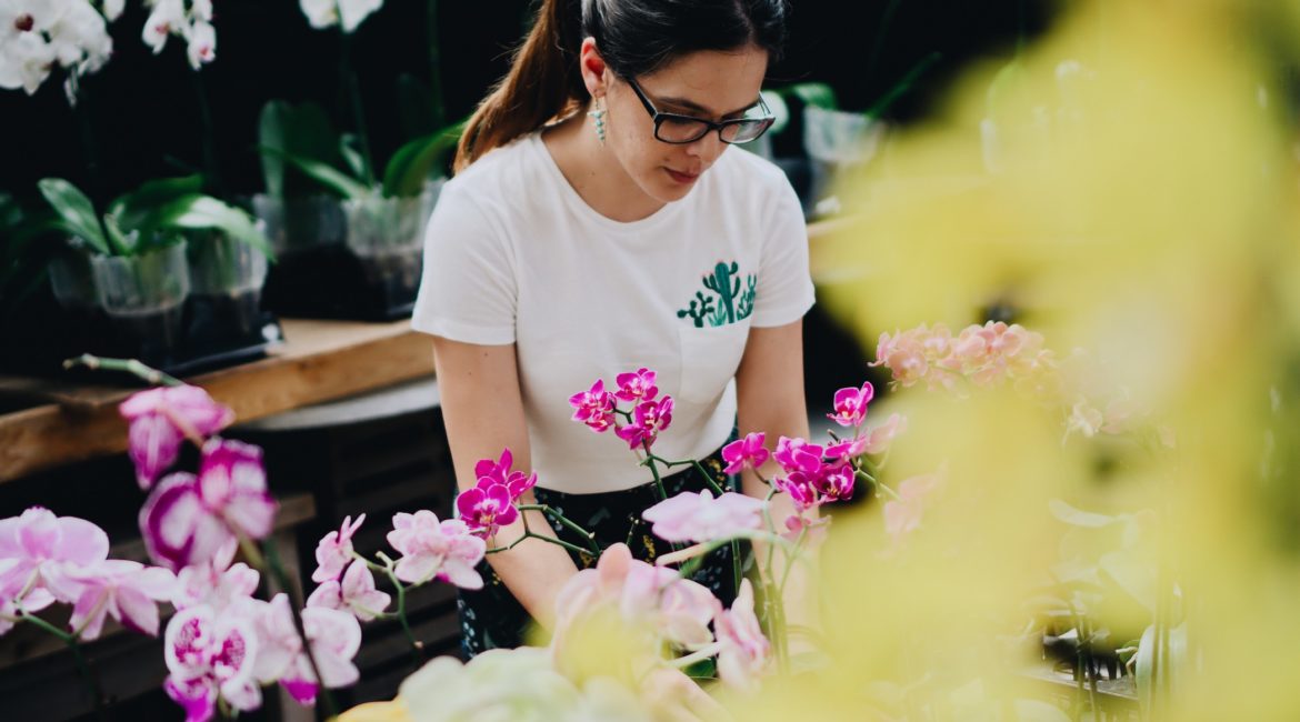 Girl tending some flowers