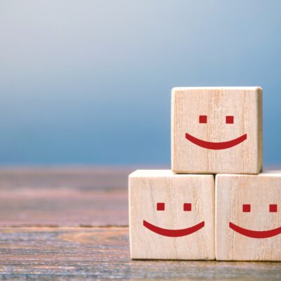 three wooden blocks on a table