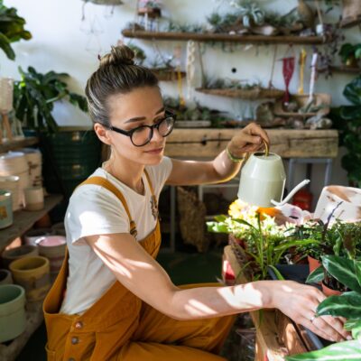 Woman watering plants